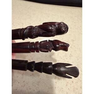 Three vintage hand-carved ebony wood hair pins, with a bird, frog and monkey.